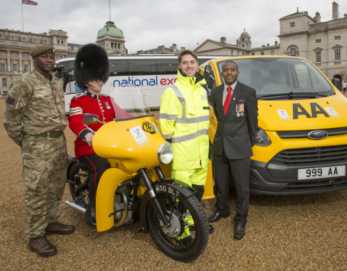 The Defence Secretary Michael Fallon, has recognised employers who have made an outstanding commitment to support the Armed Forces, presenting gold awards to the winners of the Armed Forces Covenant Employer Recognition Scheme (ERS). He met with officials from National Express coaches and the Automobile Association at Horsguards Parade in Whitehall, London, along with Serving and ex serviceman Duane Porteous. He served in 23 Pioneer Regiment, Royal Logisitics Corps for six and a half years. He has been a coach driver for National Express for the past two years. Pictured L-R: Irish Guardsman Corporal Richard Daudy, Sgt Patrick Nelson, Irish Guards, AA patrolman Max Holdstock amd National Express driver and ex serviceman Duane Porteous.