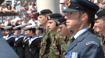 Royal Navy, British Army and Royal Air Force troops line up on the Parade Ground in Cardiff for Armed Forces Day 2010