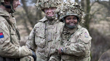 Personnel from the 1st Regiment, Royal Horse Artillery share a joke during a lull in tempo working on Ex Steel Sabre.