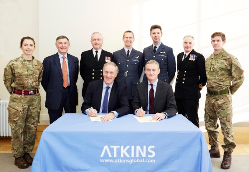 Atkins Global signing the Armed Forces Covenant with representatives from the armed forces