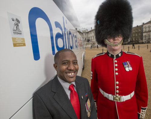 Pictured L-R: National Express driver and ex serviceman Duane Porteous with Irish Guardsman Sergeant Patrick Nelson. The Defence Secretary has recognised employers who have made an outstanding commitment to support the Armed Forces