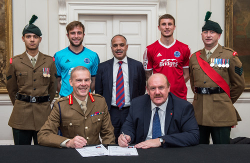 L to R Lance Corporal Frankie McCabe, jake Gallagher, Shahid Azeem, Sean McGinty Sgt Alan Roberts. Major General John Crackett and Brian Barwick. The National League, the competition which covers the fifth and sixth tiers of football in England & Wales, has joined an ever growing list of leading companies and organisations in signing the Armed Forces Corporate Covenant.