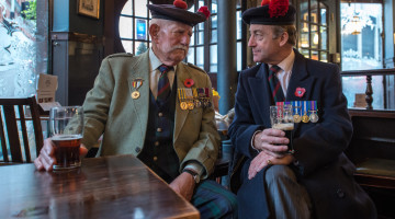 Veterans Joe Hubble and Tim Cole from the Black Watch Association catch up for a swift pint.