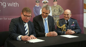 Former Minister of State for the Armed Forces The Rt Hon Mark Francois MP, Vodafone UK CEO Jeroen Hoencamp, Vice Chief of Defence Staff Air Chief Marshal Sir Stuart Peach signing Vodafone UK’s Armed Forces Covenant at the Partnering with Defence: Employer Conference 2015 on 11 March 2015
