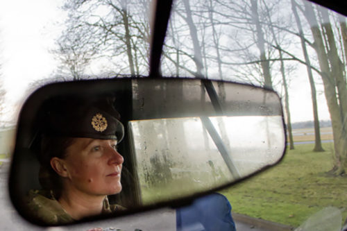 A Royal Air Force Reservist driving a car