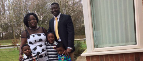 Lance Corporal Baffour Asante and family outside their new home