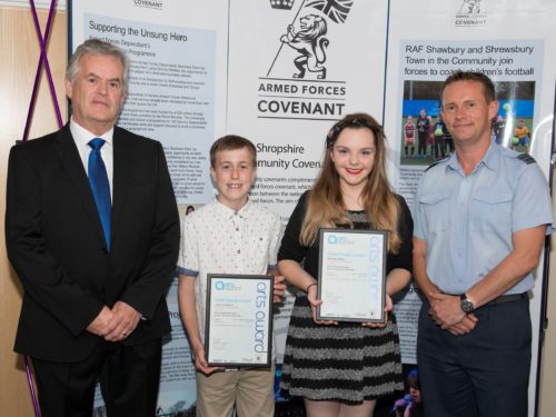 Trinity College Bronze Awards are presented to Jamie Compton and Bethany Doyle on completion of an Armed Forces Covenant intitiative Connect-Create.From L-R Mr Simon Jones, Shropshire Council, Jamie Compton, Bethany Doyle, Wg Cdr Marcus Collinge